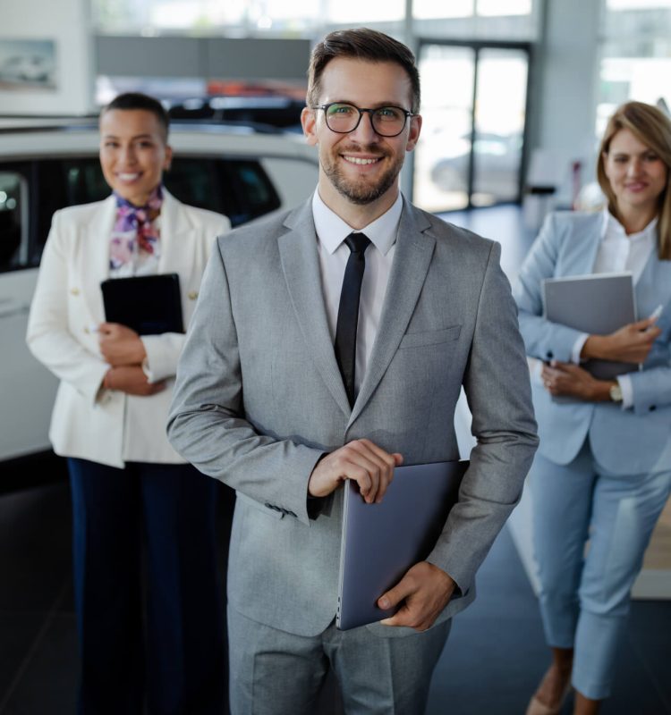salesteam-in-dealership-three-beautiful-consultants-or-managers-in-elegant-suit-looking-on-camera-.jpg salesteam-in-dealership-three-beautiful-consultants-or-managers-in-elegant-suit-looking-on-camera-.jpg
